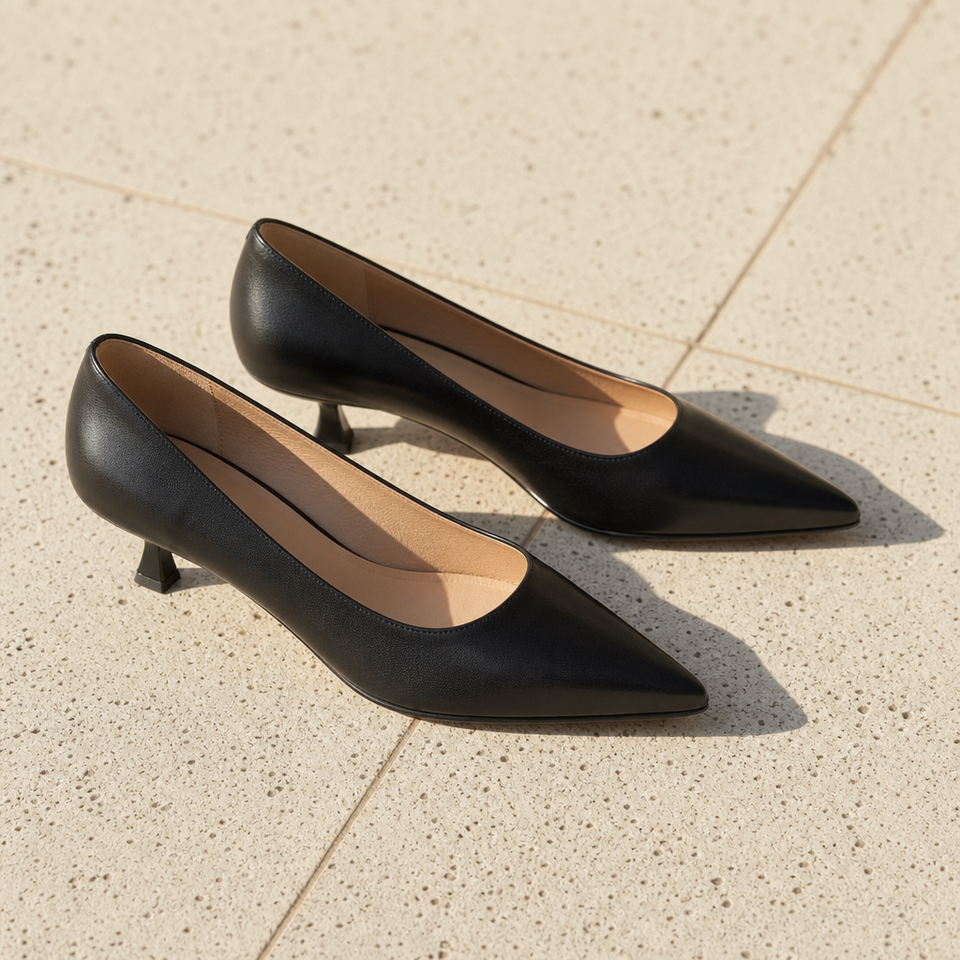 Kyrenia Pointed Toe Leather Pumps in Black